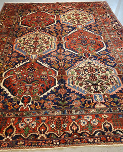 Tribal Made Bakhtiari Rug with Rich Saffrom