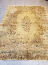 Load image into Gallery viewer, botton left view of a kerman room sized rug, heavily muted colors and lots of patina