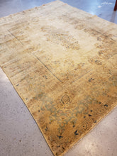 Load image into Gallery viewer, Light side or top view right side of a kirman hand-knotted rug  with medallion colors are very muted and lots of patina