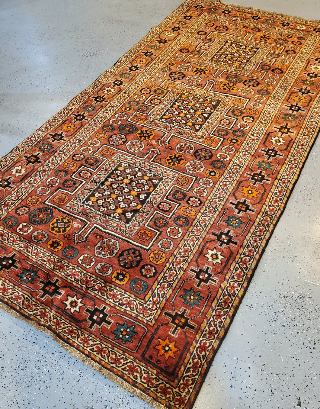 This is a top left side angled view of the Qashqai HandKnotted Area Rug