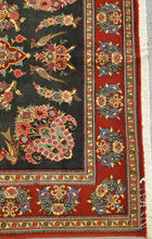 Load image into Gallery viewer, closer look of the Qom Handknotted rug&#39;s  bottom left corner border showing carpet&#39;s  floral pattern