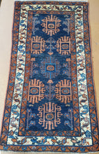 Load image into Gallery viewer, a hand knotted rug runner with 3 borders and Blue field Floral and geometric shapes
